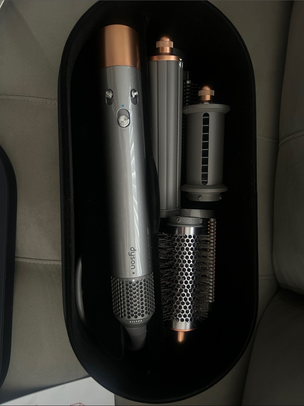 Dyson Men’s/Women’s Hair Styler in Gray with Copper Accents.